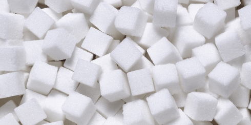 white sugar in cubes texture background